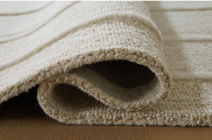 Teelgan 5' x 7' Medium Rug in Ivory/Tan
