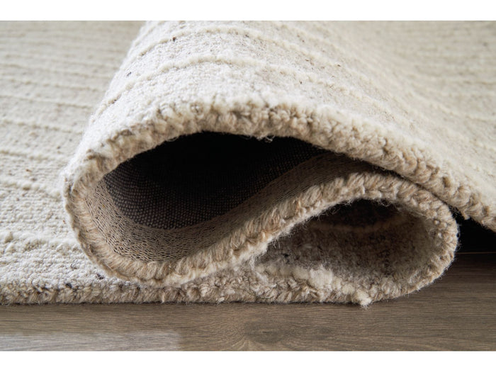 Varahill 5' x 7'' Medium Rug in Gray/Ivory
